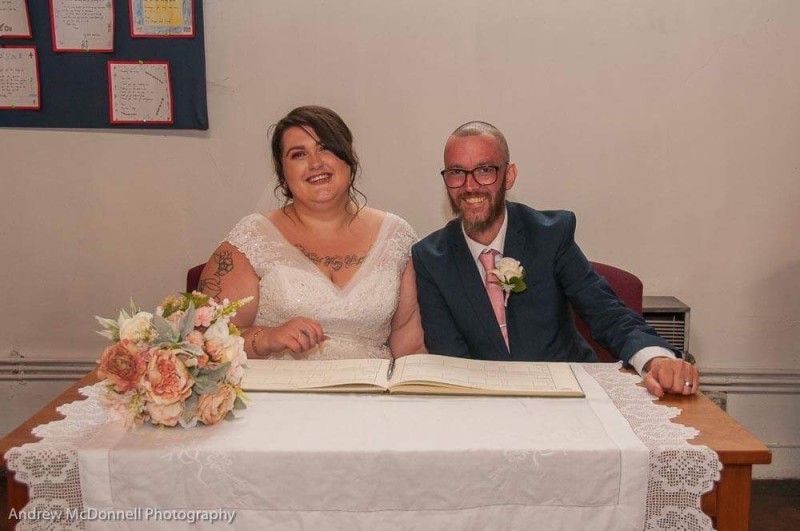 Other image for Couple tie knot with a little help from their friends